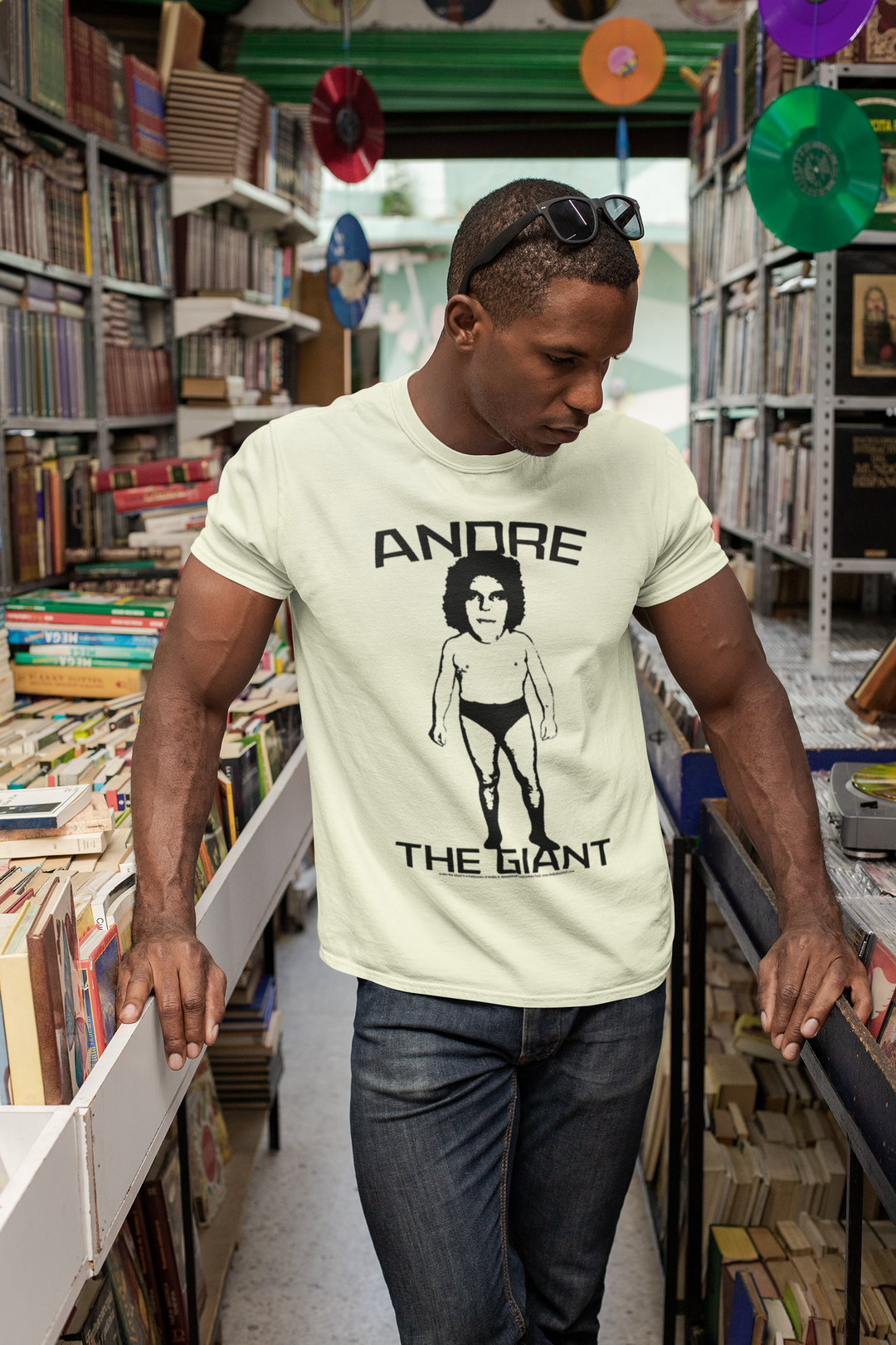 Andre The Giant WWE Wrestlemania Eighth Wonder of The World Big Head Vintage Style T-Shirt - This t-shirt features Andre The Giant, The 8th Wonder of the World, prominently displayed on the front. Celebrate the legend and show off your love for wrestling with this iconic shirt.