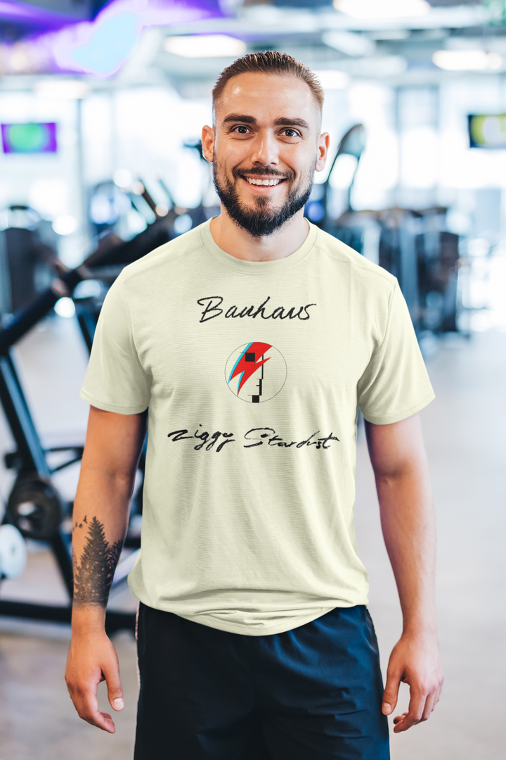 **We have a very limited supply of this t-shirt, and once sold out we are unable to get new stock as it has been discontinued**
English gothic rock band Bauhaus recorded a version of "Ziggy Stardust" as their eighth single. The band idolised Bowie, with drummer Kevin Haskins recalling in his book Bauhaus Undead: The Visual History and Legacy of Bauhaus their first time meeting the late singer-songwriter while on the set of the 1983 gothic horror film The Hunger, in which Bowie starred.