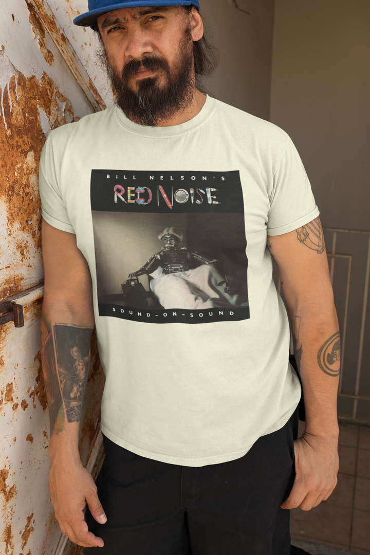 Bill Nelson's Red Noise Sound on Sound T-shirt  - Following the release of the album ‘Drastic Plastic’ ,Bill Nelson disbanded Be Bop Deluxe. Aware of the emergence of the so-called New Wave artists and out of a desire to continually evolve and progress as a musician, he announced the formation of a new band, Red Noise. 
Working with co-producer John Leckie, Bill recorded a new wave masterpiece, a record that would influence a new generation of musicians with its intelligent and punchy material.