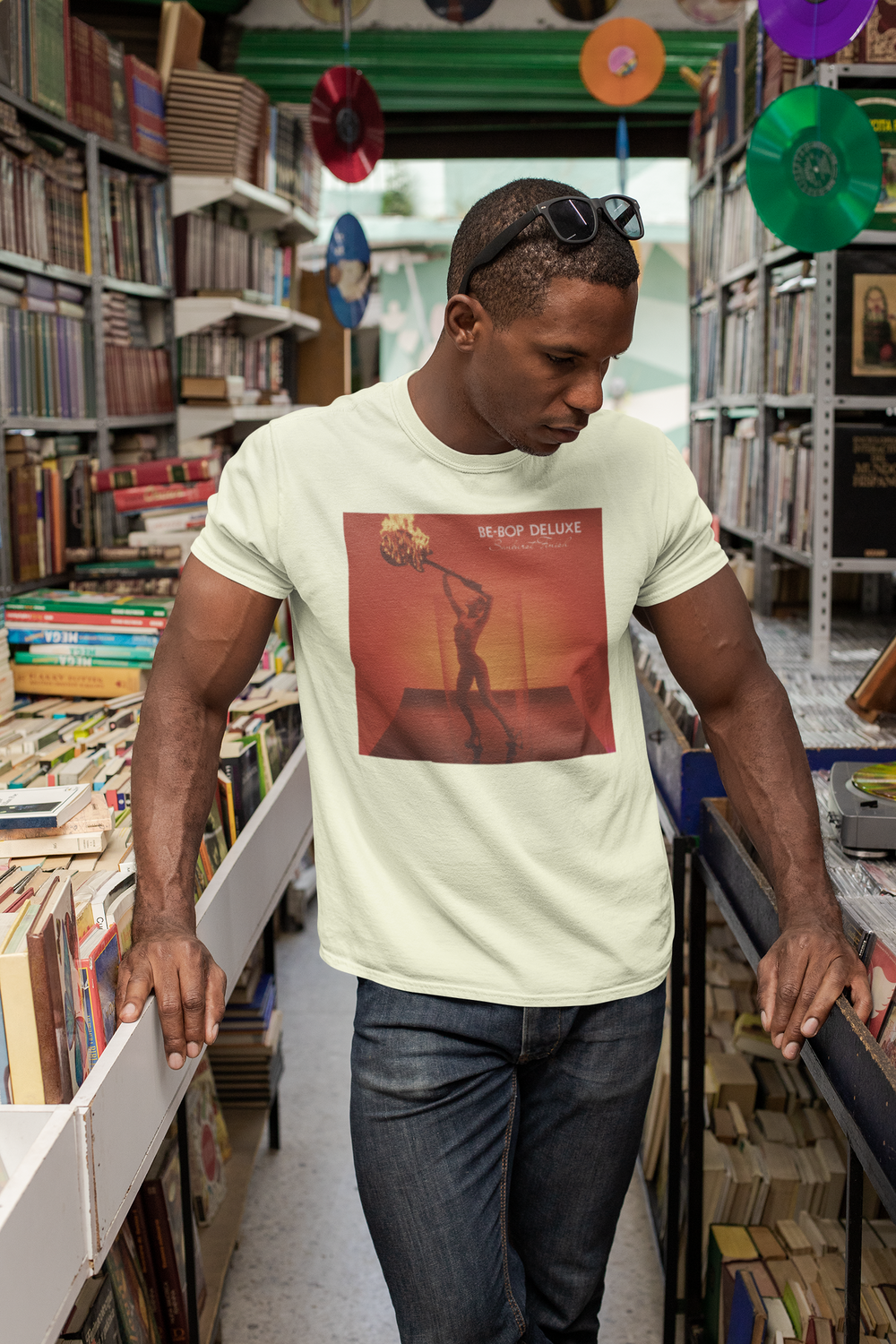 Be-Bop Deluxe Bill Nelson Sunburst Finish T-shirt - An album of immense musical inventiveness and creativity, ‘Sunburst Finish’ was one of the finest albums of its era, a perfect cohesion of ten classic songs written by Nelson. Including such classic tracks as ‘Heavenly Homes’, ‘Crying To The Sky’, ‘Sleep That Burns’, ‘Life In The Air Age’, and ‘Blazing Apostles’, the album also spawned the hit single ‘Ships In The Night’ and launched Be-Bop Deluxe as one of the major breakthrough acts of 1976.