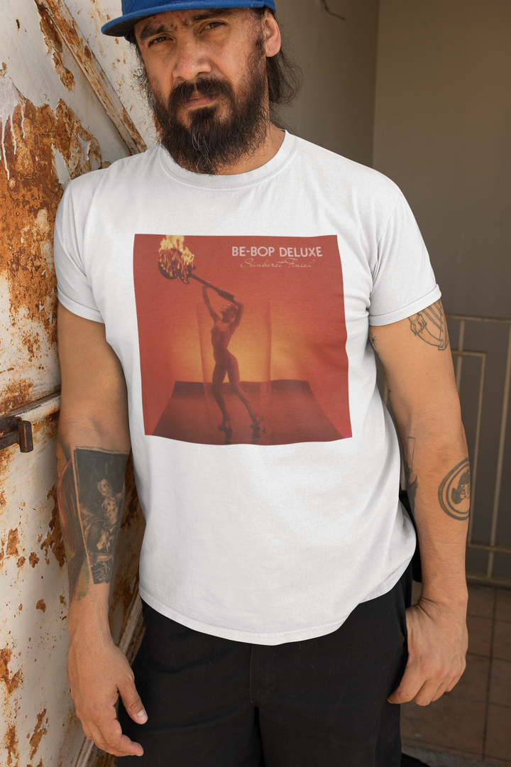 Be-Bop Deluxe Bill Nelson Sunburst Finish T-shirt - An album of immense musical inventiveness and creativity, ‘Sunburst Finish’ was one of the finest albums of its era, a perfect cohesion of ten classic songs written by Nelson. Including such classic tracks as ‘Heavenly Homes’, ‘Crying To The Sky’, ‘Sleep That Burns’, ‘Life In The Air Age’, and ‘Blazing Apostles’, the album also spawned the hit single ‘Ships In The Night’ and launched Be-Bop Deluxe as one of the major breakthrough acts of 1976.