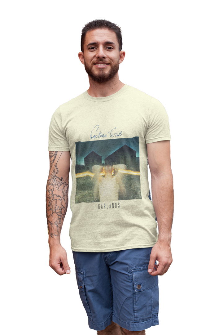 Cocteau Twins - Garlands T-Shirt 
Cocteau Twins were a Scottish post-punk/ethereal/dream pop band formed in 1981 in Grangemouth, Falkirk. Known for their unique sound and ethereal vocals, the band captivated audiences with their dreamlike melodies and atmospheric music. With a career spanning over 15 years, Cocteau Twins left an indelible mark on the music industry before disbanding in 1997. Their innovative approach to music continues to inspire artists today.