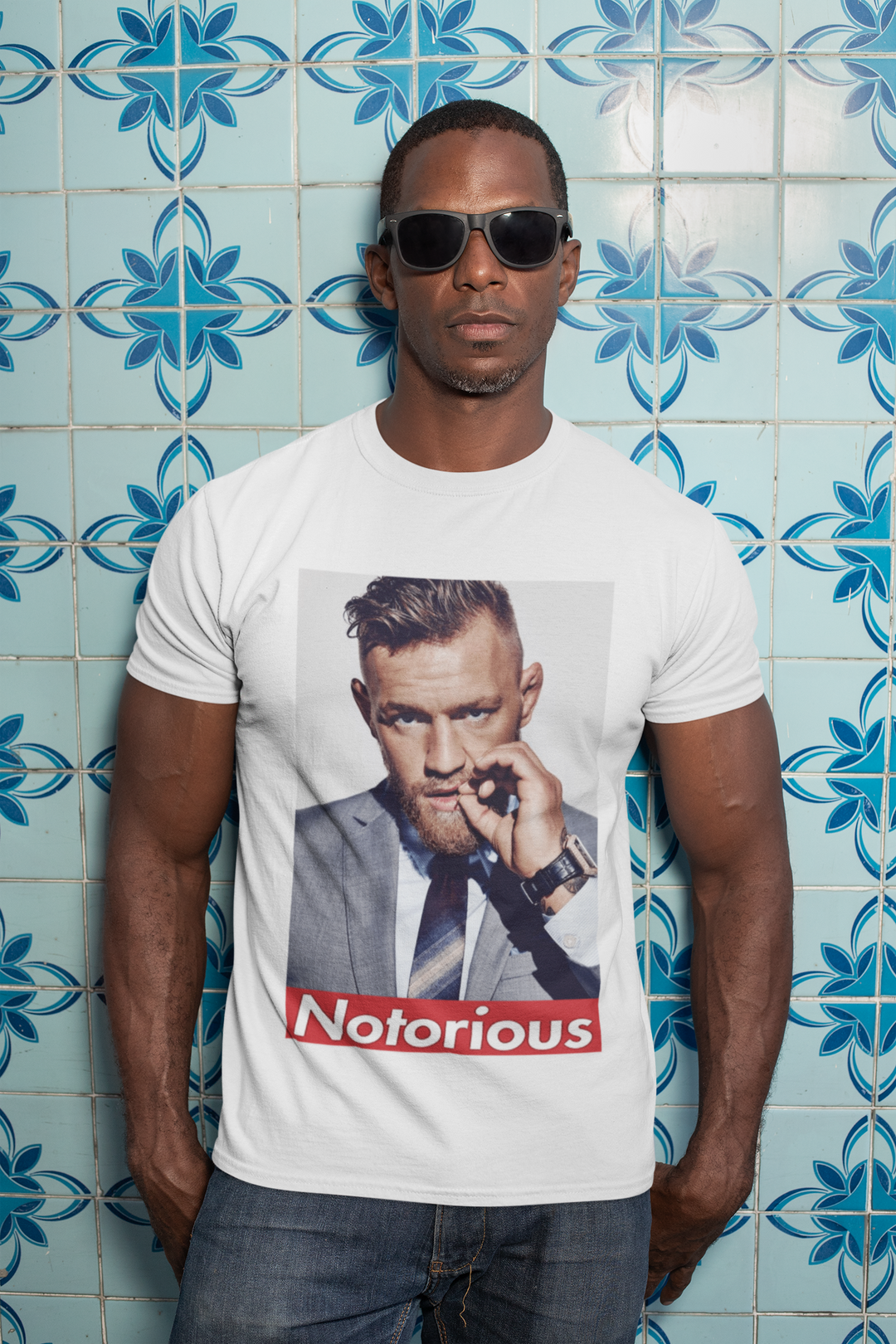 Show your support for Conor McGregor with this UFC T-shirt featuring The Notorious graphic. Perfect for fans of the UFC, this T-shirt is a must-have for any collection.