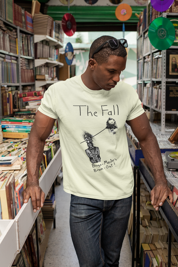 Honour the Post-Punk Pioneers! Immerse yourself in the world of Mark E Smith & The Fall with this t-shirt that pays tribute to the iconic post-punk band. From enigmatic album artwork to the unmistakable "The Fall" logo, capture the essence of their distinctive music and unconventional performances. Show your love for The Fall and let the spirit of the band elevate your style with unmatched post-punk brilliance!