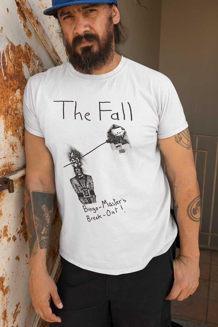 Honour the Post-Punk Pioneers! Immerse yourself in the world of Mark E Smith & The Fall with this t-shirt that pays tribute to the iconic post-punk band. From enigmatic album artwork to the unmistakable "The Fall" logo, capture the essence of their distinctive music and unconventional performances. Show your love for The Fall and let the spirit of the band elevate your style with unmatched post-punk brilliance!