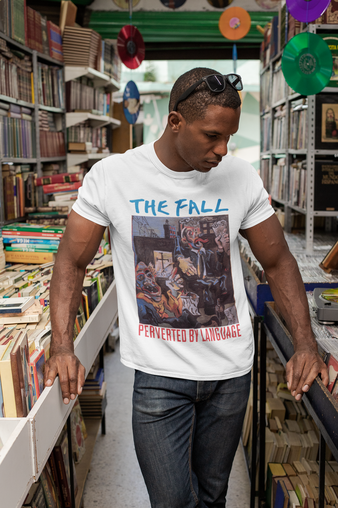 Honour the Post-Punk Pioneers! Immerse yourself in the world of Mark E Smith & The Fall with this t-shirt that pays tribute to the iconic post-punk band. From enigmatic album artwork to the unmistakable "The Fall" logo, capture the essence of their distinctive music and unconventional performances. Show your love for The Fall and let the spirit of the band elevate your style with unmatched post-punk brilliance!