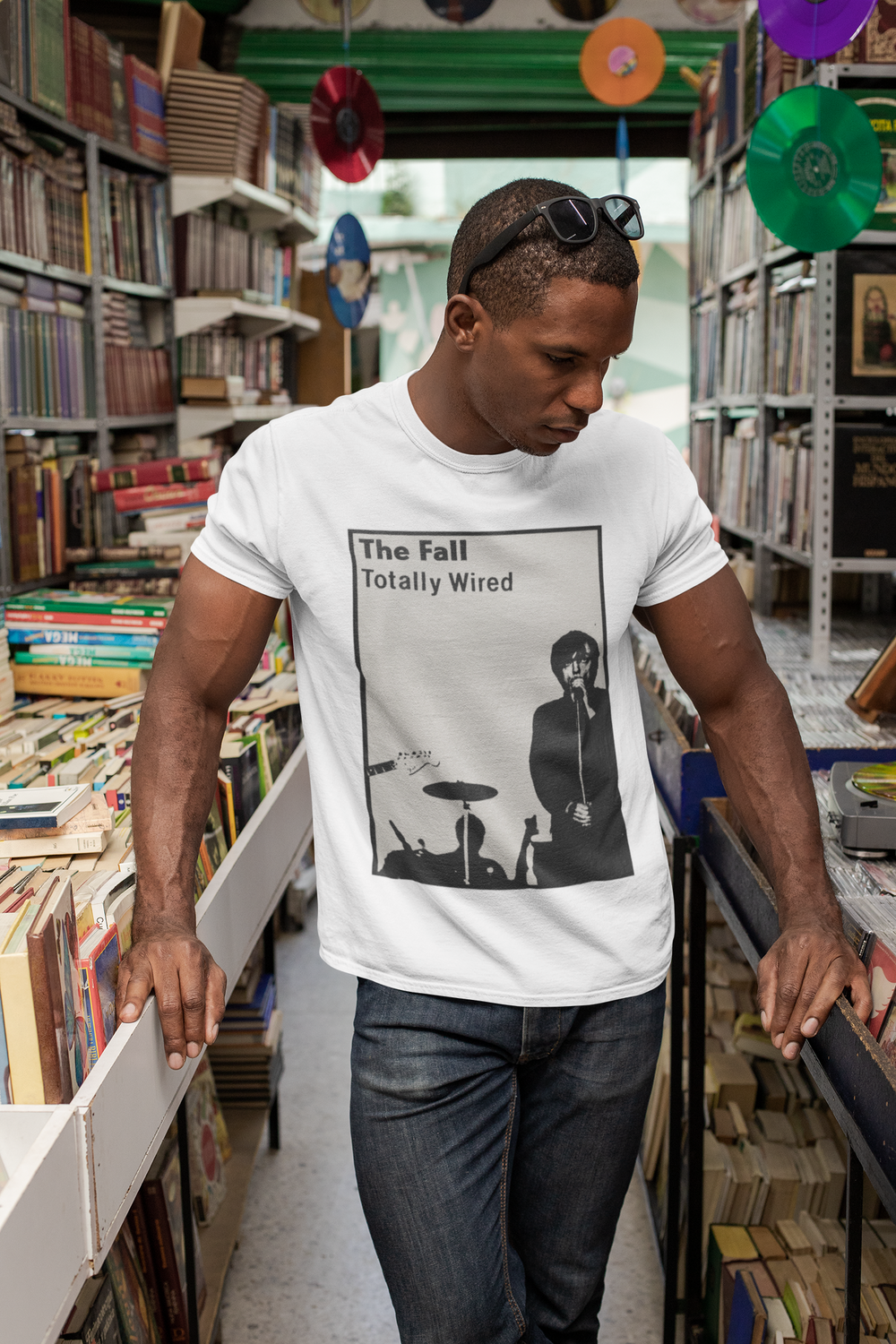 Honour the Post-Punk Pioneers! Immerse yourself in the world of Mark E Smith & The Fall with this t-shirt that pays tribute to the iconic post-punk band. From enigmatic album artwork to the unmistakable "The Fall" logo, capture the essence of their distinctive music and unconventional performances. Show your love for The Fall and let the spirit of the band elevate your style with unmatched post-punk brilliance!