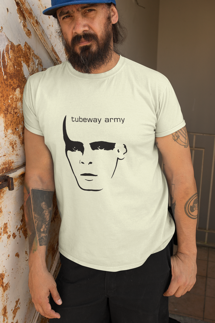 Gary Numan Tubeway Army Tribute T-shirt
Gary Numan is a renowned artist who began his musical journey as a punk rocker in the band Mean Street but eventually formed his own punk band called Tubeway Army. Gary Numan soon
stumbled upon a "Minimoog" synthesizer left behind in the studio, which captivated him with its unique sound. His early experiences as a punk rocker laid the foundation for his innovative approach to electronic music and paved the way for his future success as an artist.