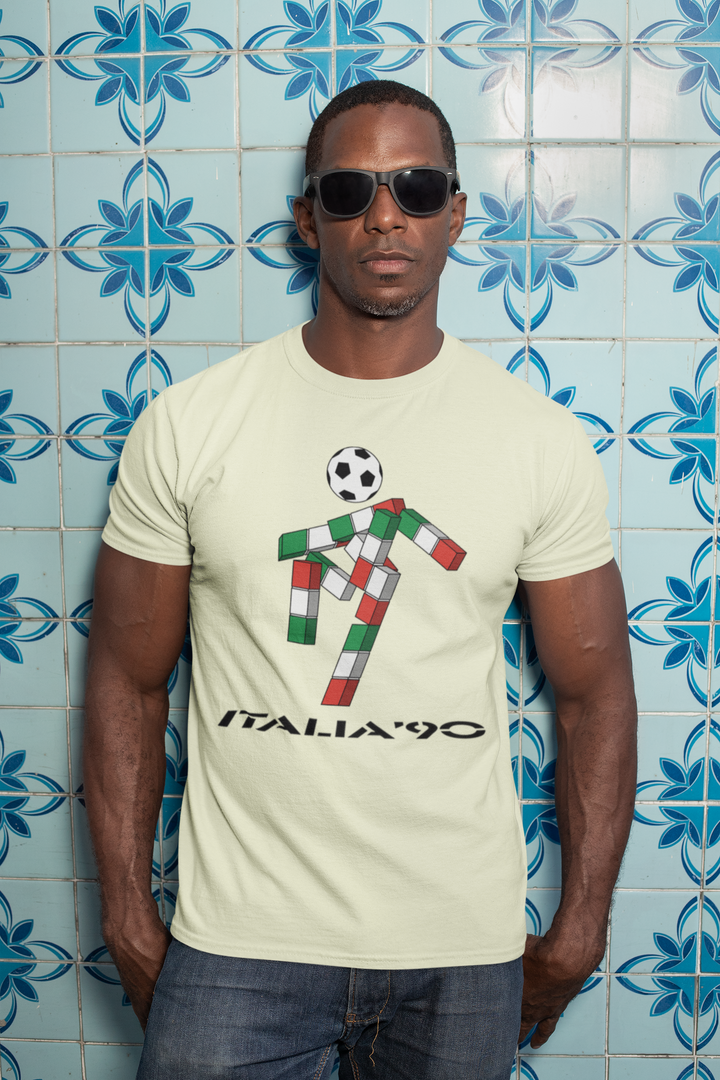 We love a retro t-shirt here and our ultra cool Italia 90 t-shirt is no exception. Ciao was the mascot for the 1990 FIFA World Cup in Italy: 
A gender-neutral, futuristic stick figure with a football head and an Italian tricolor body that spelled out "ITALIA" 
Designed by Lucio Boscardin, a self-taught graphic designer.
