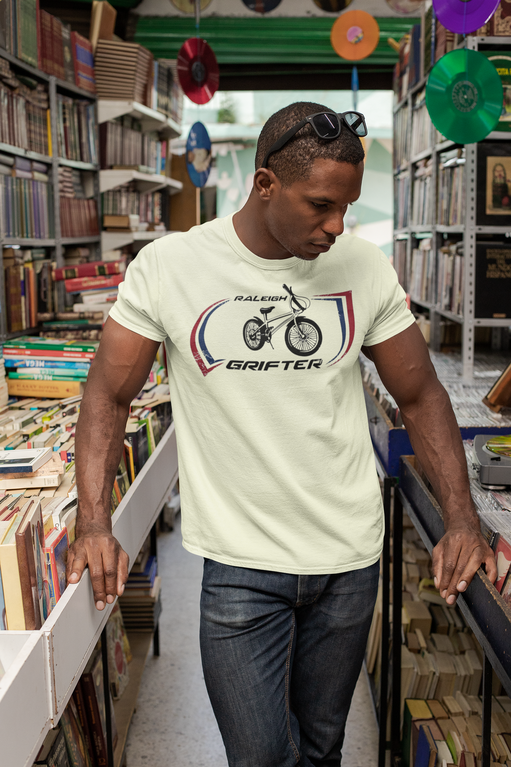 The Raleigh Grifter As worn by Marc Bolan of T. REX T-shirt
Get a piece of 70's vintage with this Raleigh Grifter t-shirt as worn by cool glam rock star Marc Bolan. The Raleigh Grifter was along with the Raleigh Chopper one of the iconic bikes of the 1970's.