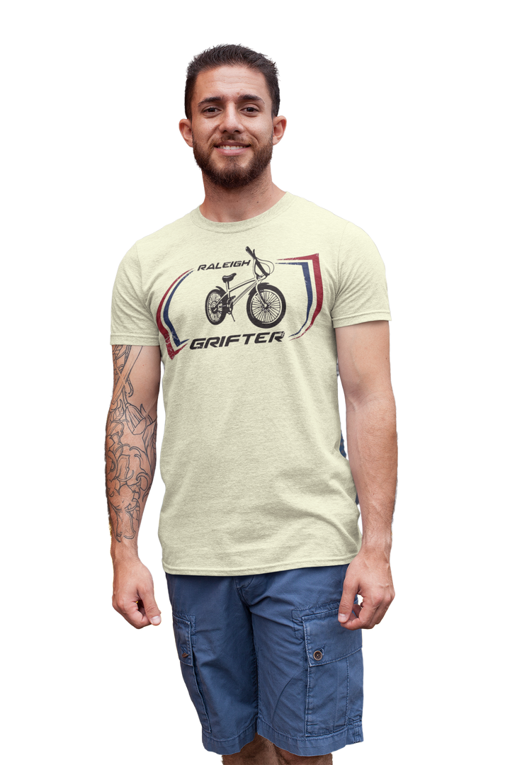 The Raleigh Grifter As worn by Marc Bolan of T. REX T-shirt
Get a piece of 70's vintage with this Raleigh Grifter t-shirt as worn by cool glam rock star Marc Bolan. The Raleigh Grifter was along with the Raleigh Chopper one of the iconic bikes of the 1970's.