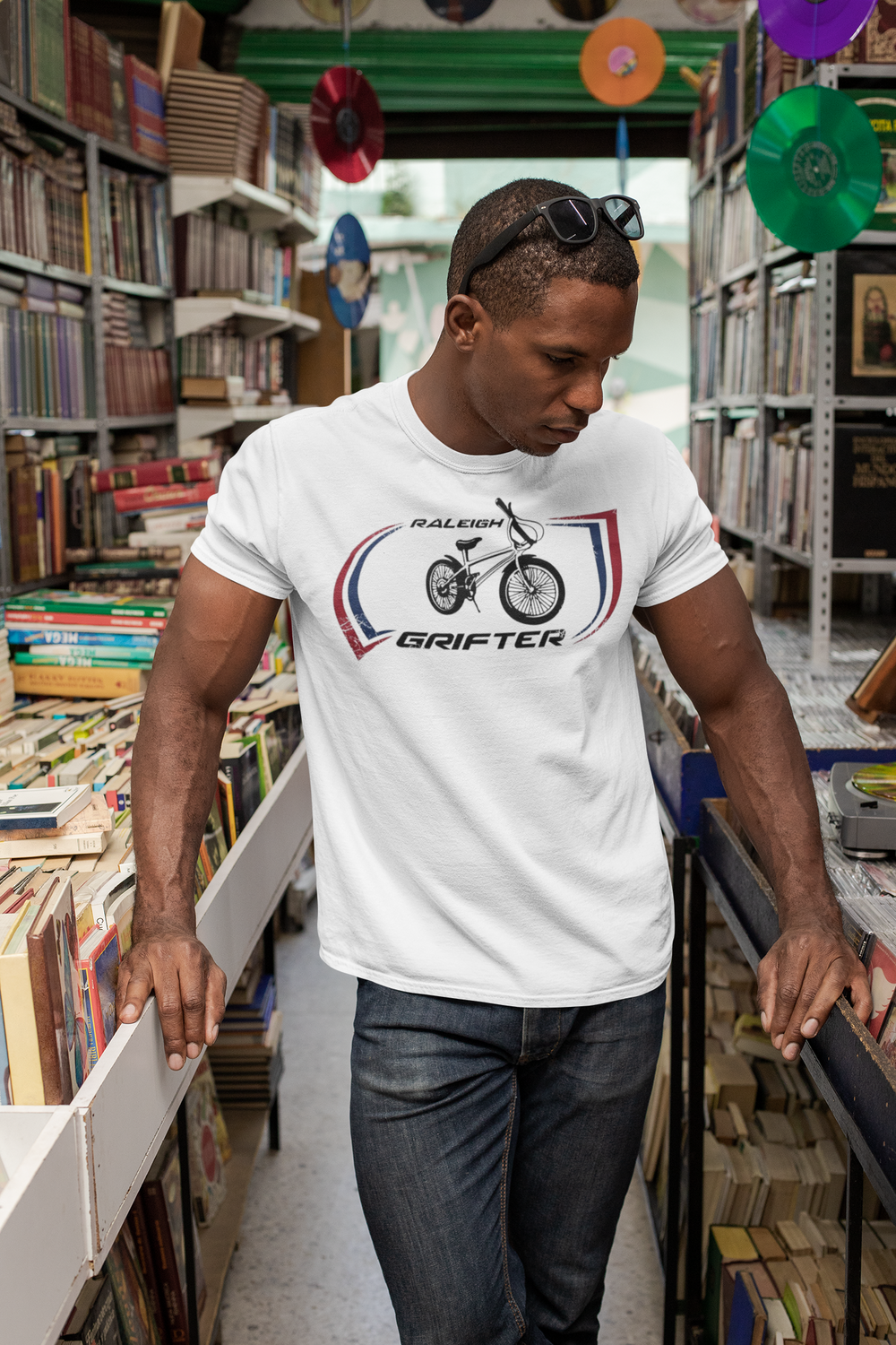 The Raleigh Grifter As worn by Marc Bolan of T. REX T-shirt
Get a piece of 70's vintage with this Raleigh Grifter t-shirt as worn by cool glam rock star Marc Bolan. The Raleigh Grifter was along with the Raleigh Chopper one of the iconic bikes of the 1970's.
