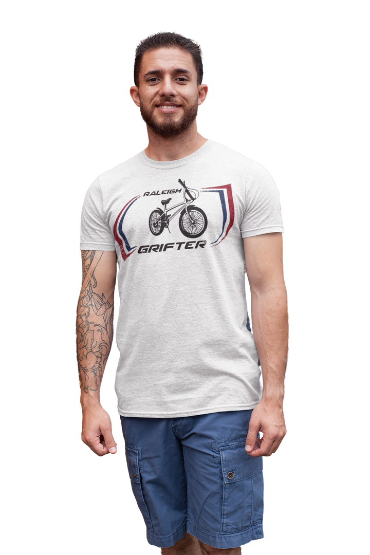 The Raleigh Grifter As worn by Marc Bolan of T. REX T-shirt
Get a piece of 70's vintage with this Raleigh Grifter t-shirt as worn by cool glam rock star Marc Bolan. The Raleigh Grifter was along with the Raleigh Chopper one of the iconic bikes of the 1970's.