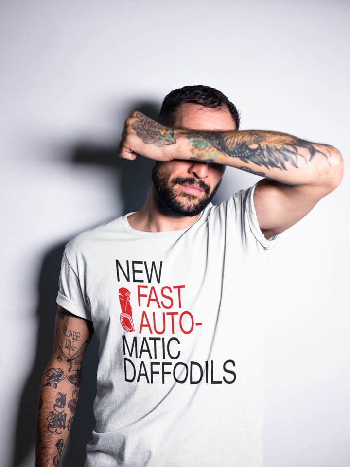 New Fast Automatic Daffodils New FADs T-shirt
New Fast Automatic Daffodils (a.k.a. "New FADs") were an indie rock group from Manchester, England, their early material combined danceable guitar licks with elements of post-punk, funk, dub and Krautrock. The band's songwriting evolved on their second album, "Body Exit Mind", showcasing a broader emotional range. They reached their creative peak on the third album, "Love It All", which marked the end of their journey as a group.